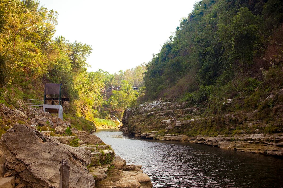 The Oyo River flowing between limestone banks in Gunungkidul